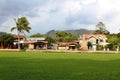 Costa Rica soccer field with houses in the back side Royalty Free Stock Photo
