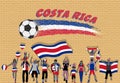 Costa Rican football fans cheering with Costa Rica flag colors i Royalty Free Stock Photo