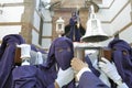 Costaleros bearing a Tronos during Semana Santa