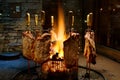 Costela, bovine beef ribs, traditional brazilian barbecue on skewer been grilled on barbecue fire
