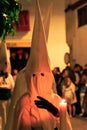 Costume of people in procession of Nazarenos in Spain
