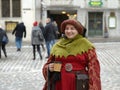 A girl in medieval dressing on the streets of Tallinn.