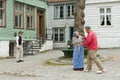 Costumed actors playing in Gamle Bergen Museum