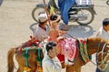 Costumed child on a horse in a parade in Myanmar