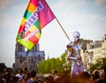 Costumed gay man wearing flag