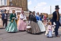 Costumed members of the Dickens Festival parade