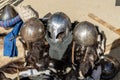Costumed participants celebrate the Middle Ages in a recreation of a grand festival, wearing protective armour and helmets made Royalty Free Stock Photo
