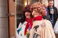 Costumed women in the streets of Prague during the carodejnice festival, or witch burning night Royalty Free Stock Photo