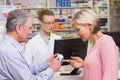 Costumers talking about medicine Royalty Free Stock Photo