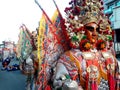 These are the costumes worn by temple workers during processions. They form the core part of Chinese culture. doll face close-up