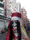 These are the costumes worn by temple workers during processions. They form the core part of Chinese culture. doll face close-up