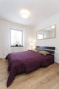 Cosy flat - violet bedroom Royalty Free Stock Photo