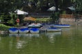 Cosy nook for summer relaxation with wooden pontoon and boat in lake Ariana, park Borisova gradina Royalty Free Stock Photo