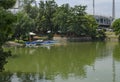Cosy nook for summer relaxation with wooden pontoon and boat in lake Ariana, park Borisova gradina Royalty Free Stock Photo