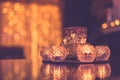 Christmas composition warm candles, dried oranges on table. Holiday, New Year, Christmas, cosiness concept. Cozy home Royalty Free Stock Photo