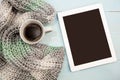 Cosy soft winter background, knitted sweater tablet Cup hot coffee old vintage wooden board. Christmas holidays at home. place for Royalty Free Stock Photo