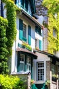 Cosy traditional building exterior on street in Paris Royalty Free Stock Photo