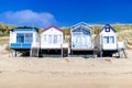 Cosy vacation homes standing along the coastline. Summer concept. Vacation rentals. Retreat. Spring. Nature therapy. Royalty Free Stock Photo