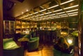 A Cosy and Warm Whisky & Cigar Jazz Bar at Night with Customers in Hong Kong