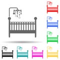 cot with toys multi color style icon. Simple glyph, flat vector of baby icons for ui and ux, website or mobile application Royalty Free Stock Photo