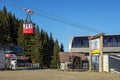 Red cable car transportation at Cota 1400m station in Bucegi Mountains, Romania Royalty Free Stock Photo