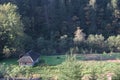 Cotage and the beautiful scenic forests on sky background in Carpathian Mountains, Ukraine