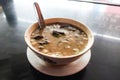 Coto served in a bowl on the table, traditional Makassar Royalty Free Stock Photo