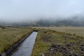 Cotopaxi national park area, stream, fog Royalty Free Stock Photo