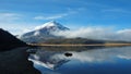 Cotopaxi volcano reflected in the water of Limpiopungo lagoon on a cloudy morning Royalty Free Stock Photo