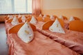 Cots in the kindergarten. Orphanage or boarding school. Beds in a boarding school or in an orphanage Royalty Free Stock Photo