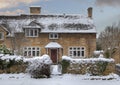 Cotswold cottage in snow Royalty Free Stock Photo