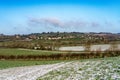 Cotswold countryside winter view across a valley to the village of Ebrington