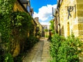 Cotswold village in summer house alleyway Royalty Free Stock Photo