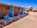 Cottage in a Bedouin Camp on the Sea in Ras Shitan in Oasis in Sinai, Taba desert with the Background of the Sea and Mountains