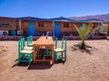 Cottage in a Bedouin Camp on the Sea in Ras Shitan in Oasis in Sinai, Taba desert with the Background of the Sea and Mountains