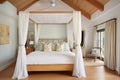 cottage bedroom with canopy bed and wooden ceiling Royalty Free Stock Photo