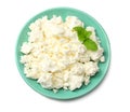 cottage cheese in blue bowl isolated on white background top view Royalty Free Stock Photo