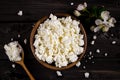 Cottage cheese in a bowl on wooden table. Style rustic. Royalty Free Stock Photo
