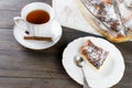 Cottage cheese casserole . Pie with cheese and cup of tea