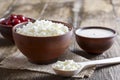 Cottage cheese on a wooden table close up Royalty Free Stock Photo