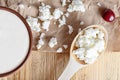 Cottage cheese on a wooden table close up Royalty Free Stock Photo