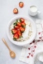 Cottage cheese, curd cheese with strawberries berries in a bowl, ogranic homemade dairy product. Healthy dairy product rich in Royalty Free Stock Photo