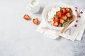 Cottage cheese, curd cheese with strawberries berries in a bowl, ogranic homemade dairy product. Healthy dairy product rich in Royalty Free Stock Photo