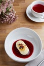 Cottage cheese pancakes with berry sauce on wooden table close up. morning table. breakfast concept Royalty Free Stock Photo