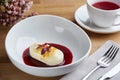 Cottage cheese pancakes with berry sauce on wooden table close up. morning table. breakfast concept Royalty Free Stock Photo