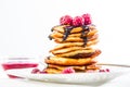 Cottage cheese pancakes with fresh raspberry and chocolate sirup