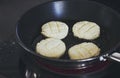 The cottage cheese pancakes fried in pan Royalty Free Stock Photo