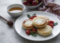 Cottage cheese pancakes, ricotta fritters on ceramic plate with  fresh strawberry Royalty Free Stock Photo