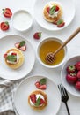 Cottage cheese pancakes, ricotta fritters on ceramic plate with  fresh strawberry Royalty Free Stock Photo