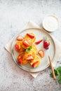 Cottage cheese pancakes, ricotta fritters or syrniki with mint and strawberries. Healthy and delicious morning breakfast Royalty Free Stock Photo